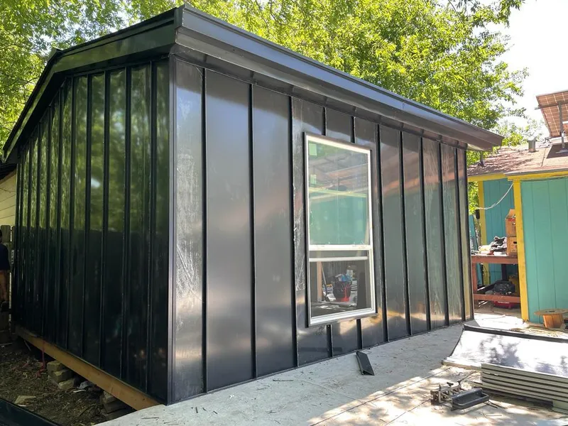 Black standing seam metal wall panels for Roof Inspection in Fairwood